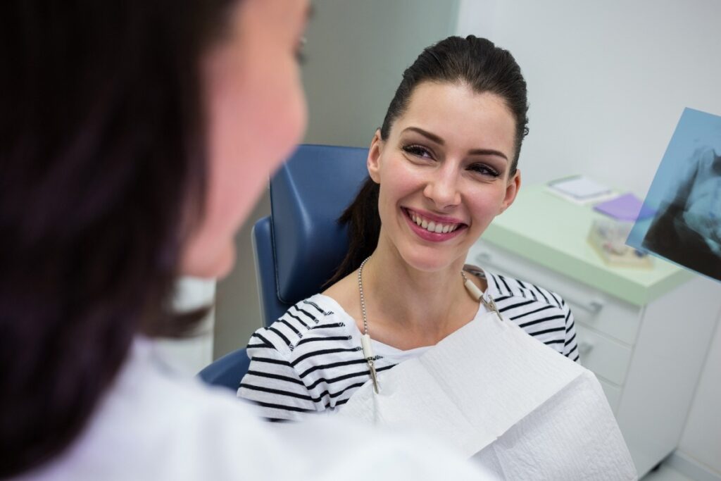 Woman during dental consultation.